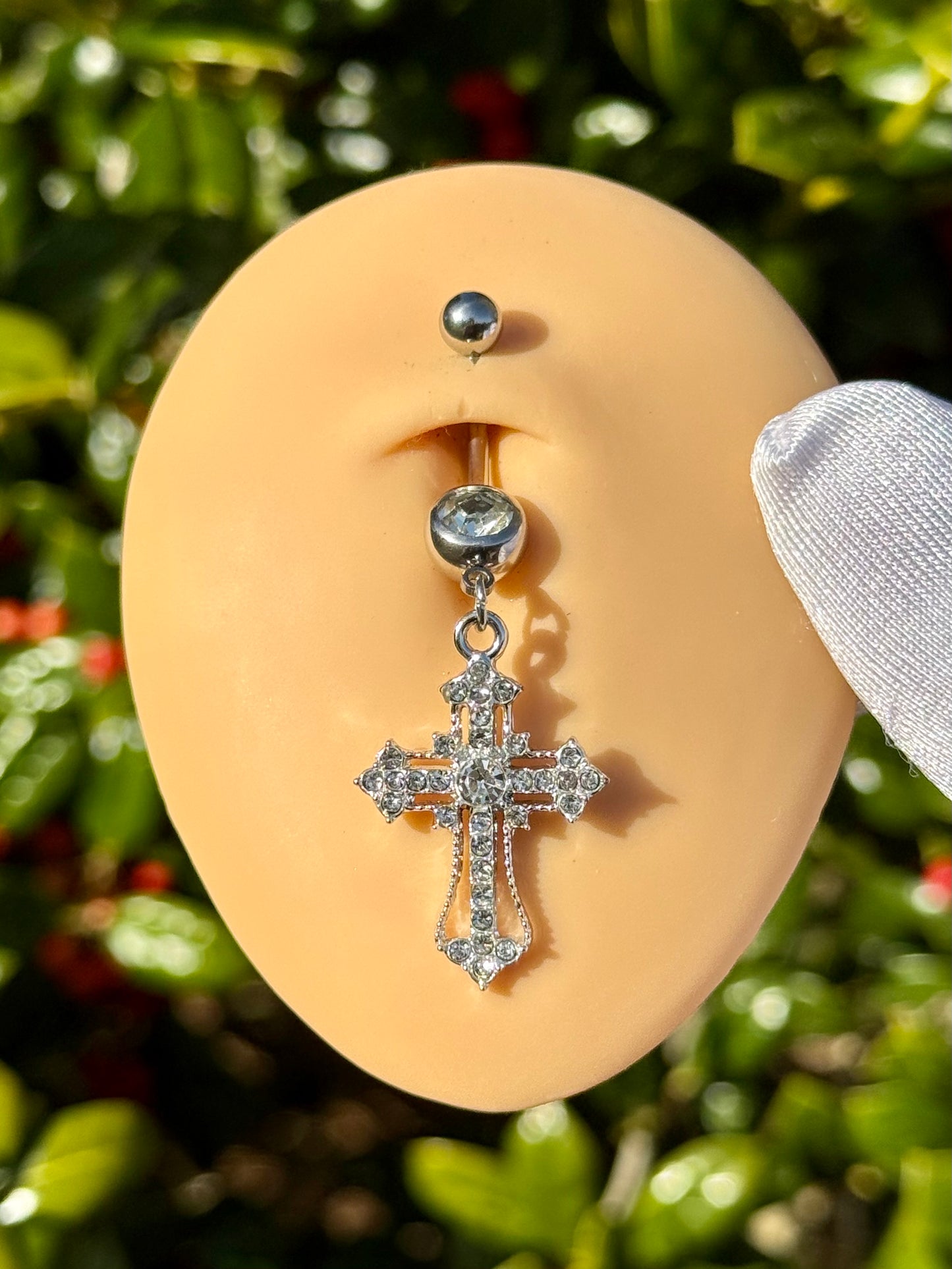 Iced out cross belly ring