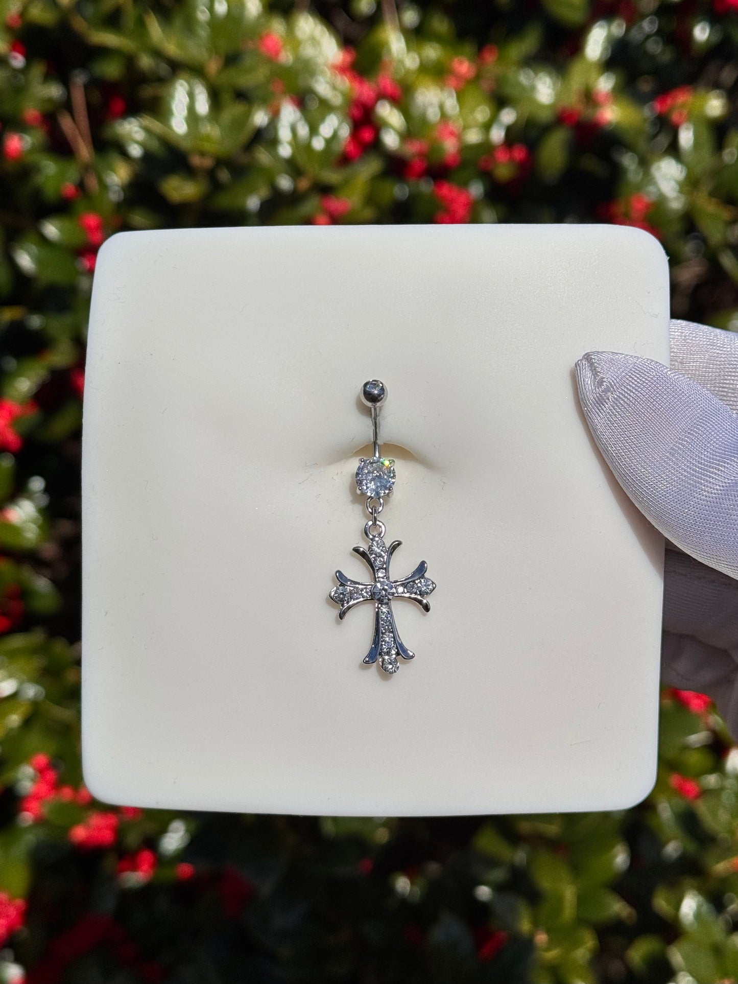 Icy cross belly ring titanium