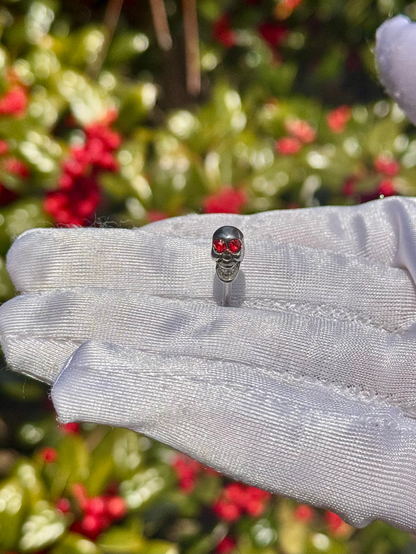 Skull head tongue ring