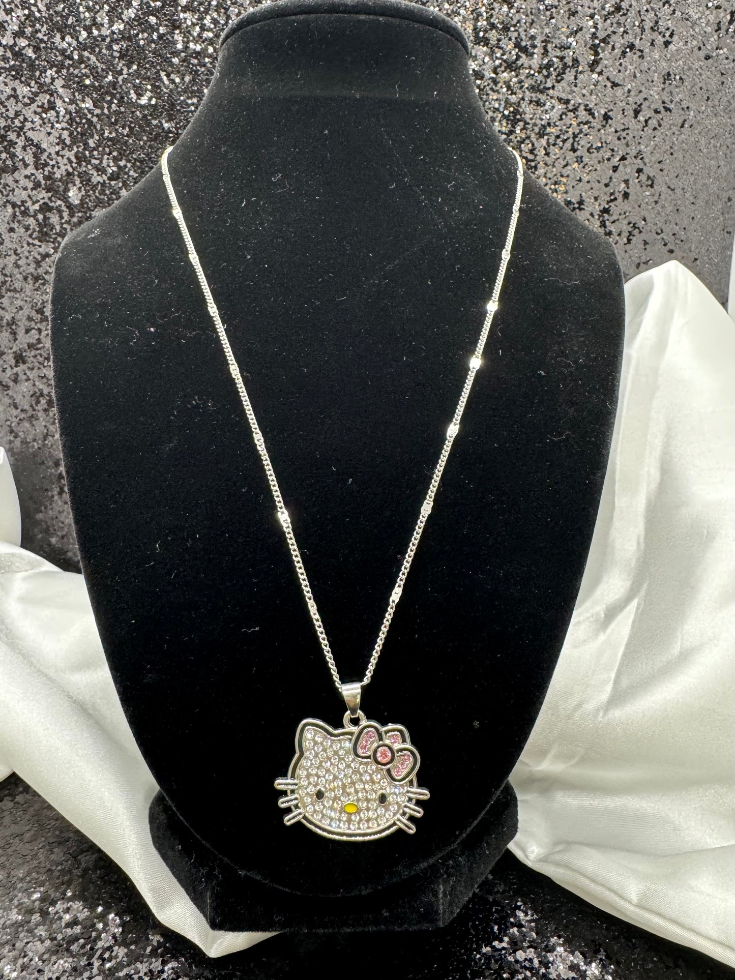 Iced out kitty chain