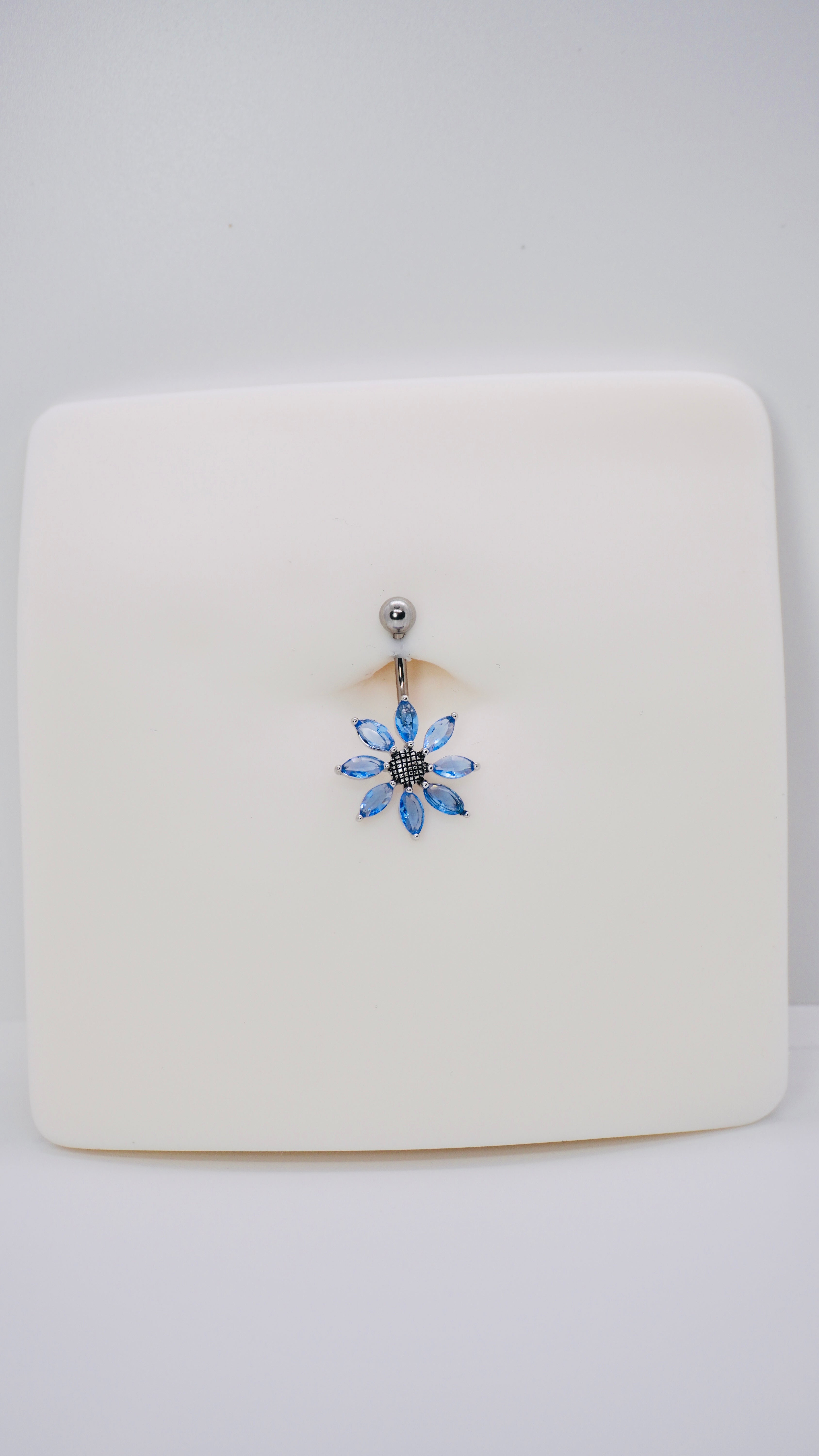 Blue flower belly ring
