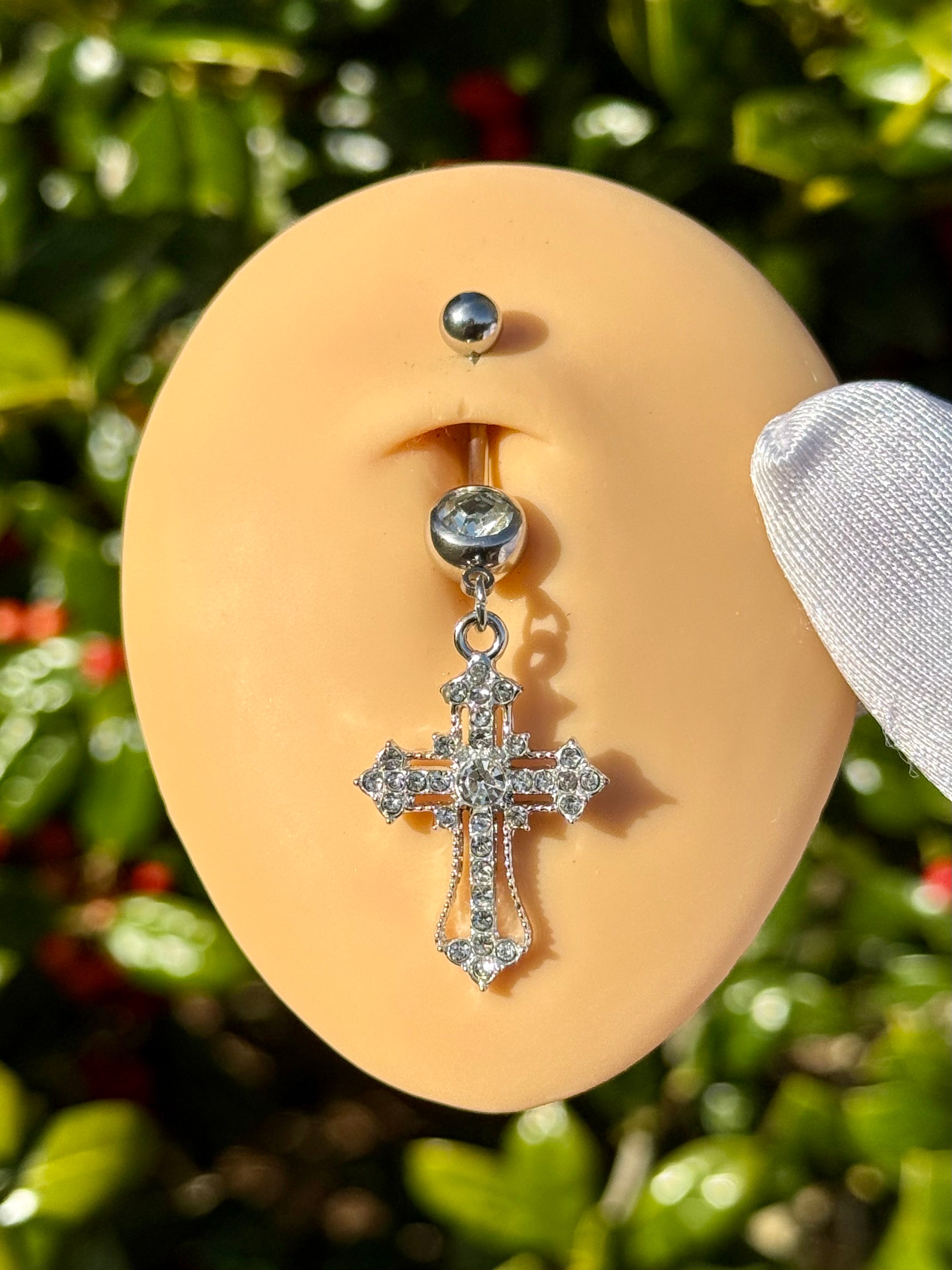 Iced out cross belly ring