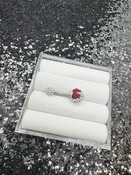 Iced out red bow belly ring